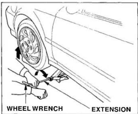 Honda Civic Coupe (1998) - Changing a Flat Tire - 4