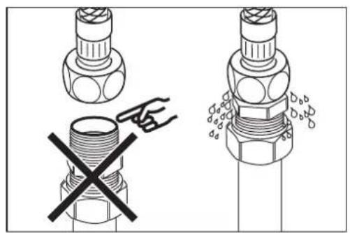 Technical diagram showing two mechanical components with a hand indicating a dislocation or mark, and a crossed-out section with symbols.