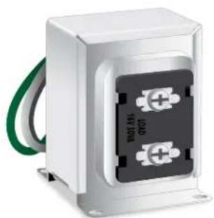 Exterior view of a white electrical terminal block with two black connectors and a green cable (no visible text or symbols)