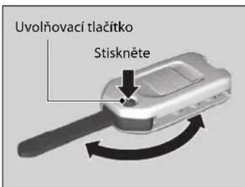 Uvolňovací tlačitko Stiskněte
