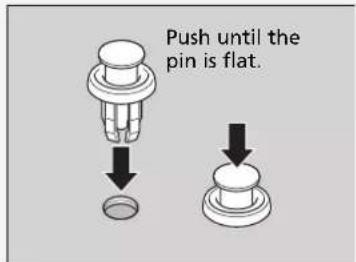 Push until the pin is flat.