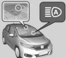 Diagram of a car with a traffic light sensor and a traffic sign labeled 'A' pointing to the dashboard area.