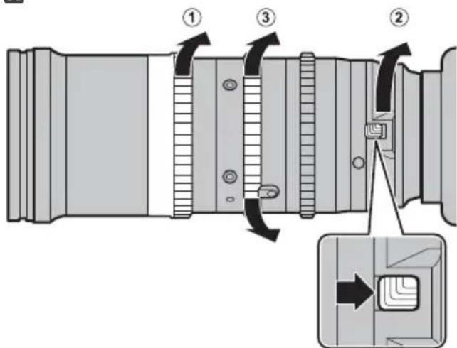 Diagram of a camera lens assembly with numbered parts and directional arrows indicating adjustment or insertion.
