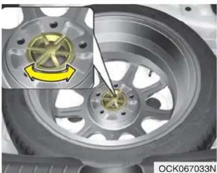 KIA Stinger (2021) - Removing and storing the spare tire - 1