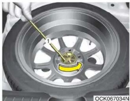 KIA Stinger (2021) - Removing and storing the spare tire - 2