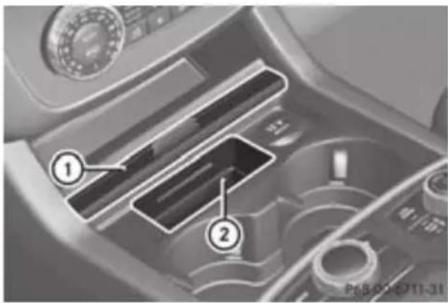 Mercedes-Benz GL (2012) - Stowage compartment in the front centre console - 1