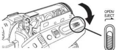 Diagram showing car interior with labeled switch and open/elect switch, highlighting a component with a magnified view.