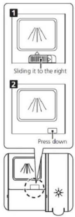Sliding it to the right Press down