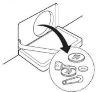 Diagram showing a mechanical component being inserted into a stack of 500 and 700 weights, with an arrow indicating the process.