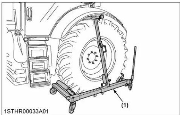 Technical line drawing of a tractor with a wheeled cart and tire assembly (no text or symbols)