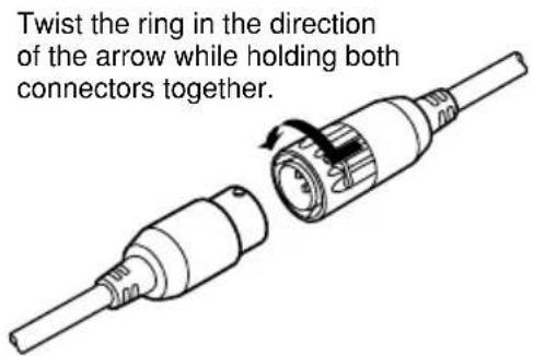 Twist the ring in the direction of the arrow while holding both connectors together.