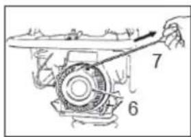 Technical diagram of a mechanical assembly with numbered components labeled 6, 7, and an arrow indicating direction.