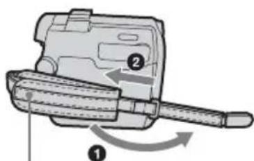 SONY DCR-HC16 - Verwenden des Riemens als Handgelenksriemen - 1