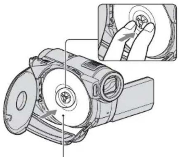 SONY HDR-UX9 - Plaats de disc met de opnamekant naar uw camcorder toe en druk vervolgens op het midden van de disc totdat deze vastklikt. - 1