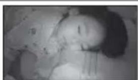 SONY HDR-UX9 - Een slapend kind in gedimd licht - 1