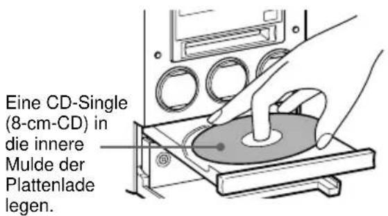 Eine CD-Single (8-cm-CD) in die innere Mulde der Plattenlade legen.