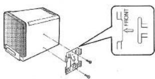Diagram showing a device with labeled components and an arrow pointing to a front indicator symbol