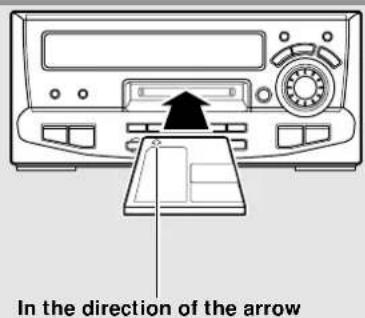 In the direction of the arrow