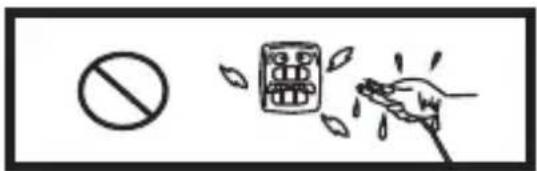 Safety warning symbol with prohibition sign and hand holding a device emitting leaf drops