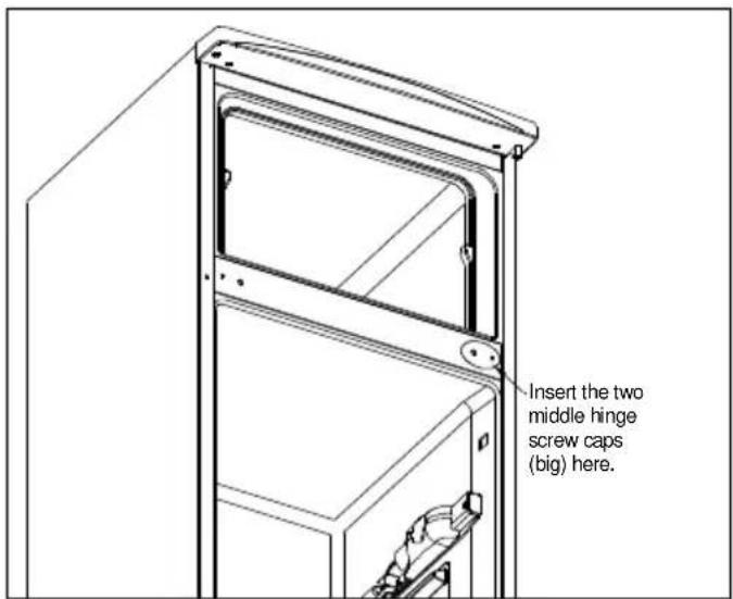 Insert the two middle hinge screw caps (big) here.