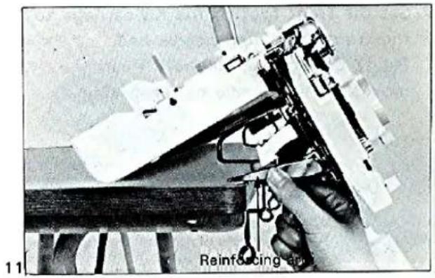 11 Reinforcing arm