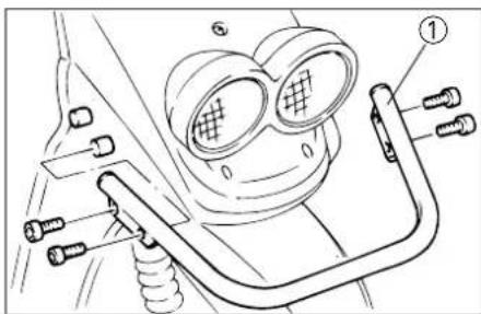 Technical diagram of a mechanical device with labeled parts, showing components like lenses and tubing.