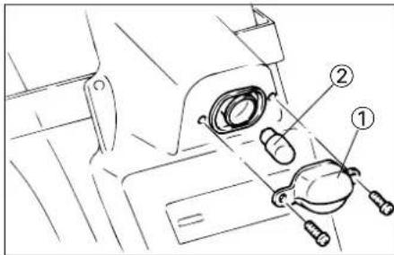 Technical diagram of a mechanical device with labeled parts, showing components like a valve and adjustment knob.