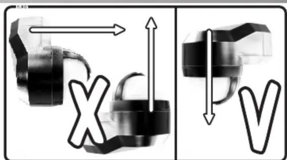 Technical diagram showing mechanical assembly with labeled components X and V, including directional arrows and component outlines.