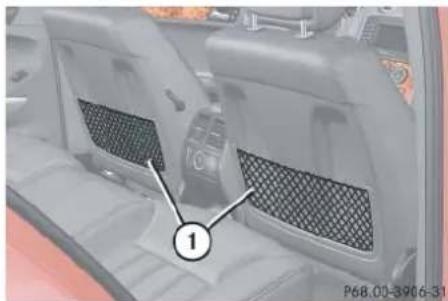 Mercedes-Benz ML 550 (2008) - Parcel nets on front seat backrests - 1