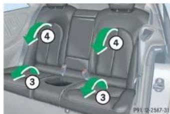 Mercedes-Benz CLK Coupe (2005) - Folding the backrest forward - 3