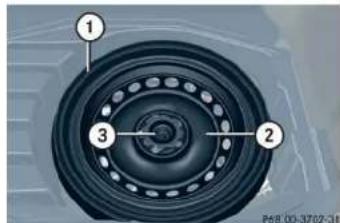Mercedes-Benz CLK Coupe (2005) - Removing the collapsible tire - 1
