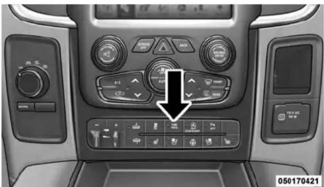 Control panel of a vehicle showing air condition meters and buttons with icons, including a black arrow pointing to a specific air condition.