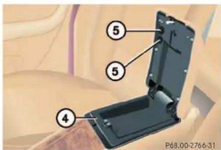 Mercedes-Benz ML-Class (2003) - Armrest storage spaces - 2