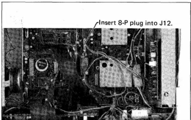 Insert 8-P plug into J12.