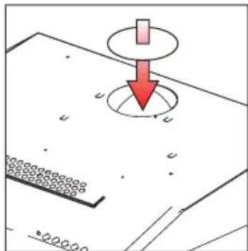 Diagram showing a red downward arrow pointing to a circular object on a textured surface, with no visible text or symbols.