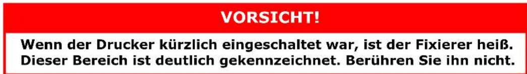 VORSICHT! Wenn der Drucker kürzlich eingeschaltet war, ist der Fixierer heiß. Dieser Bereich ist deutlich gekennzeichnet. Berühren Sie ihn nicht.