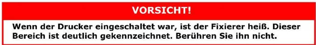 VORSICHT! Wenn der Drucker eingeschaltet war, ist der Fixierer heiß. Dieser Bereich ist deutlich gekennzeichnet. Berühren Sie ihn nicht.