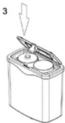 Line drawing of a device with an open lid and internal compartments, no text or symbols present