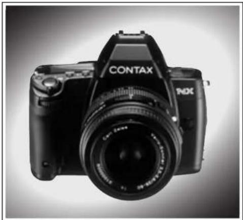 Black-and-white photo of a DAXI 3.5 DSLR camera with visible lens and control buttons (no text or symbols on body).
