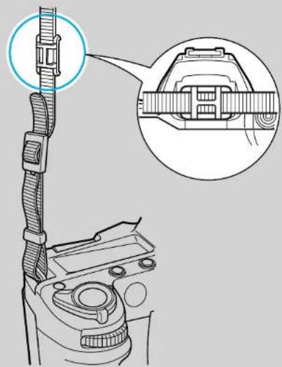 Technical diagram of a mechanical device with a magnified inset showing internal components (no text or symbols).