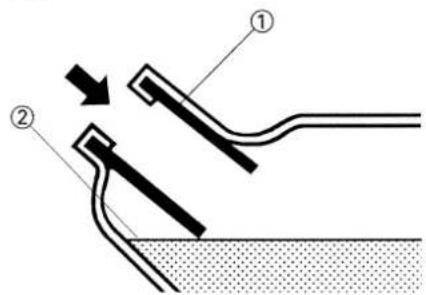 Diagram showing two labeled mechanical or electrical components with arrows indicating motion or force direction, likely illustrating a system or process.