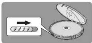 Diagram showing a device with a circular component and an arrow pointing to it, indicating direction or process.