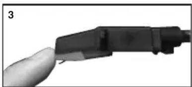 Close-up of a black electrical connector with a finger inserted, no visible text or symbols
