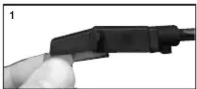 Close-up of a hand holding a black connector (no visible text or symbols)