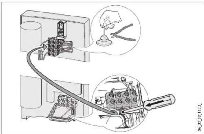 Technical diagram showing installation of a mechanical component with labeled parts and tool application instructions