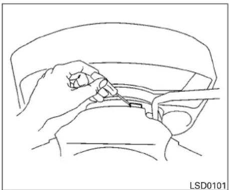 Line drawing of a hand using a tool to adjust or install a component, no text or symbols present