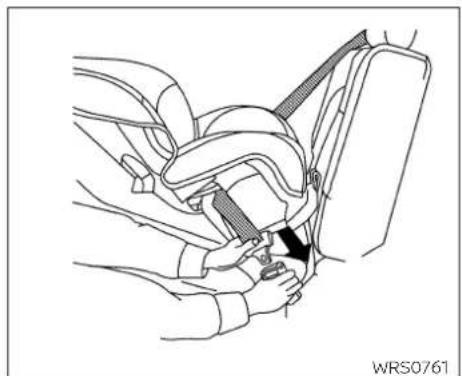 Line drawing of a car seatbelt buckle assembly with a black arrow indicating the buckle (no text or symbols present)