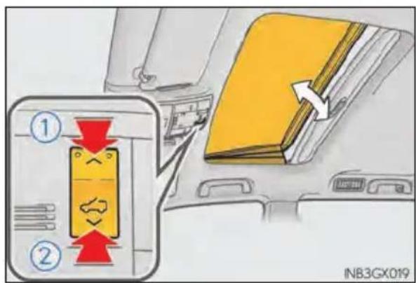 Diagram showing a car seatbelt switch with directional arrows and a numbered panel, likely illustrating seatbelt usage or safety instructions.