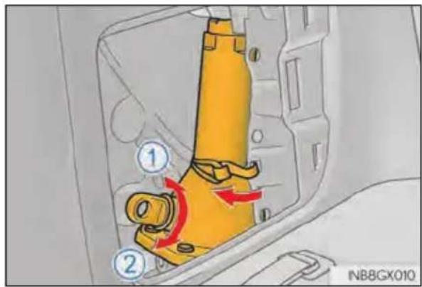 Technical diagram showing a yellow mechanical component with numbered parts and red directional arrows indicating motion or flow.