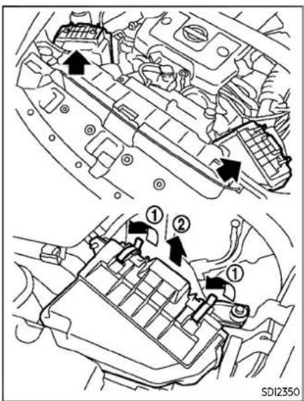 Technical diagram showing engine compartment with numbered parts and directional arrows indicating assembly or maintenance.